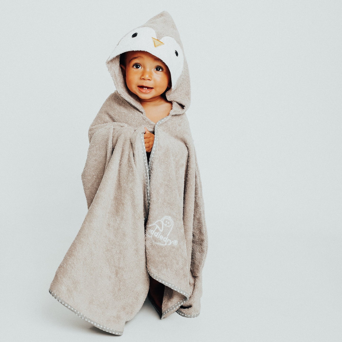 cute baby in penguin towel by Cuddledry