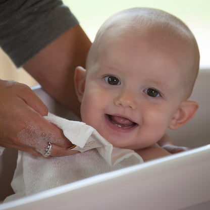 happy baby bathtimes with Cuddledry baby washcloths